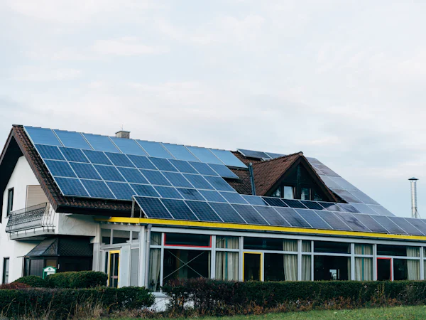 Two-story home with a full solar roof