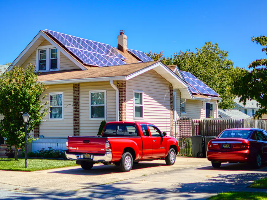 Two-story home with solar panels on the roof